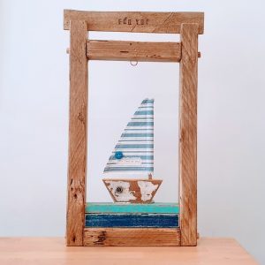 OPEN WOODEN FRAME WITH BOAT