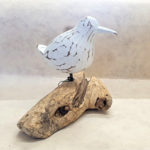 CARVED WOODEN BIRD ON DRIFTWOOD DETAIL