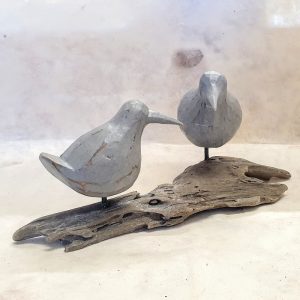 CARVED WOODEN BIRDS ON DRIFTWOOD