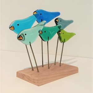 FUSED GLASS BIRDS ON WOODEN STAND DETAIL