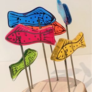 FUSED GLASS FISH ON WOODEN STAND DETAIL